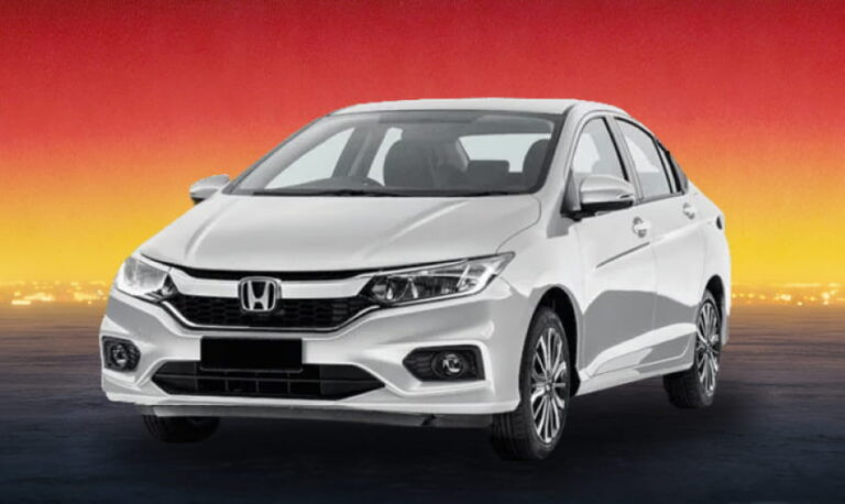 White Honda sedan against a red and yellow sunset background.