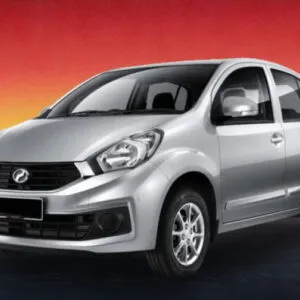 Silver Perodua Myvi 2016-2017 compact car against a dusk skyline, available for rental in Kuching