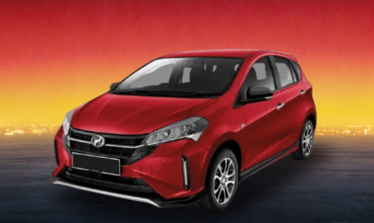 Red compact rental car against a warm twilight gradient backdrop.