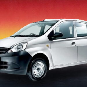Silver Perodua Viva 2014 compact car against a sunset background, budget rental in Kuching.