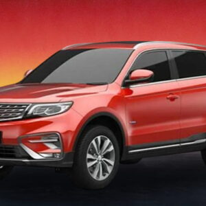 Red Proton SUV against a vivid golden-orange sunset backdrop.