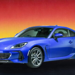 Blue Subaru BRZ 2022 sports coupe against a sunset background, available for rental in Kuching