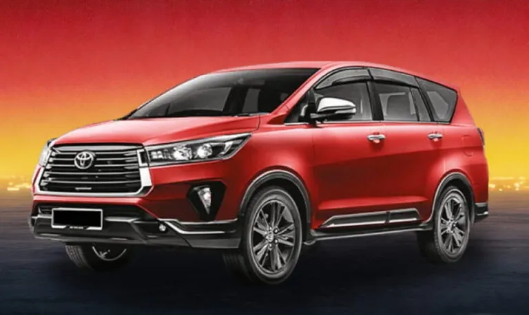 A red Toyota Innova 2020 seven seater MPV listed for rental in Kuching, Sarawak.